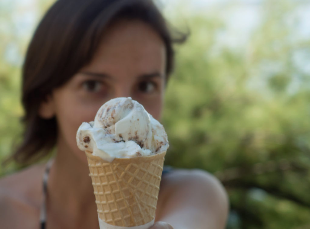 Girl offers ice cream